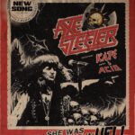 AXE STEELER ft. ACID Sängerin Kate de Lombaert – `She Was Born In Hell` Clip